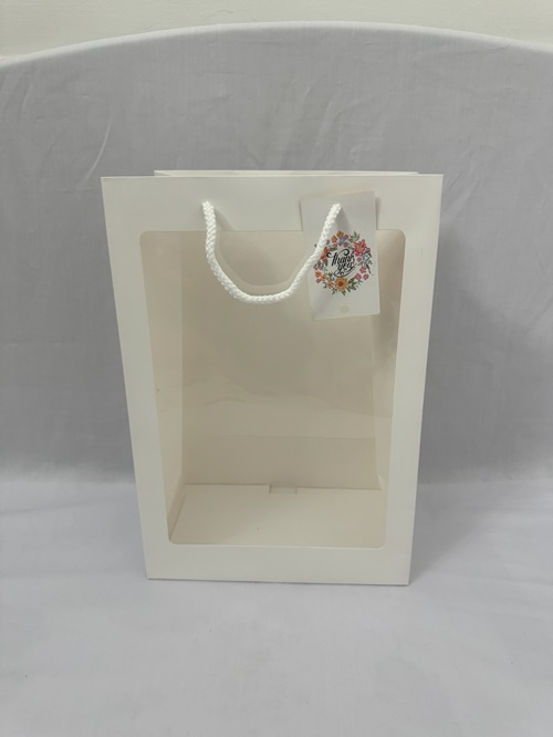 Túi giấy mặt kiếng màu trắng kèm thiệp nhỏ kích thước 36 x 24 x 15cm/túi