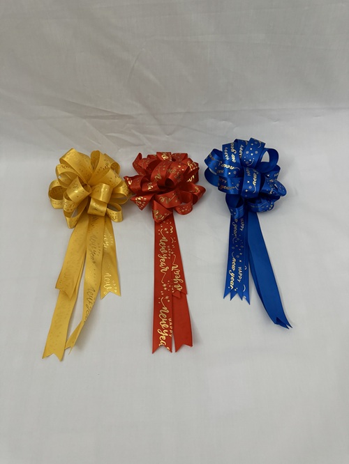 Nơ tú cầu lụa chữ happy new year đủ màu kt 15×32 cm/cái